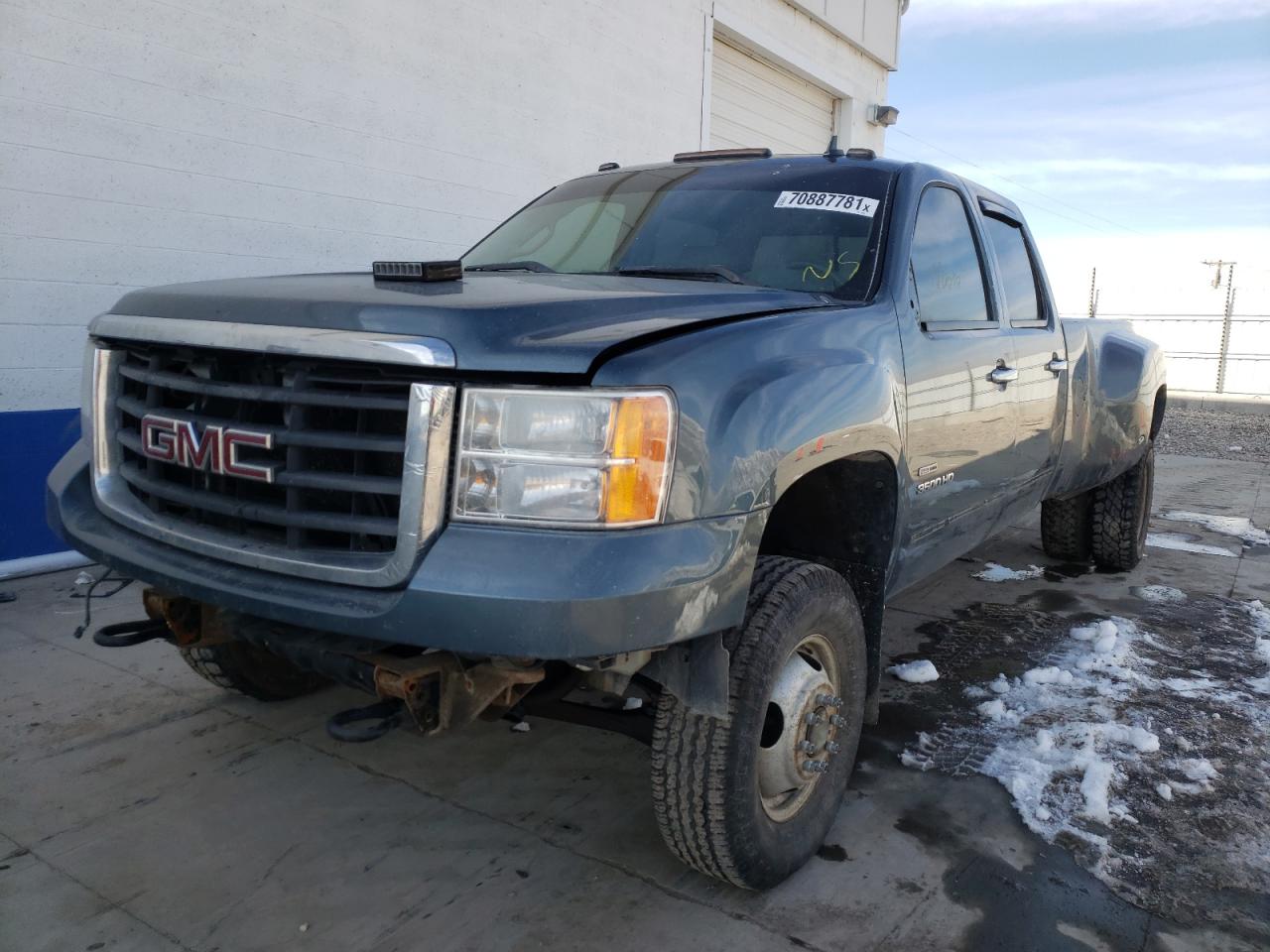 Photo 2 from auction – 2010 GMC SIERRA K35 with VIN 1GT7K4B69AF122629
