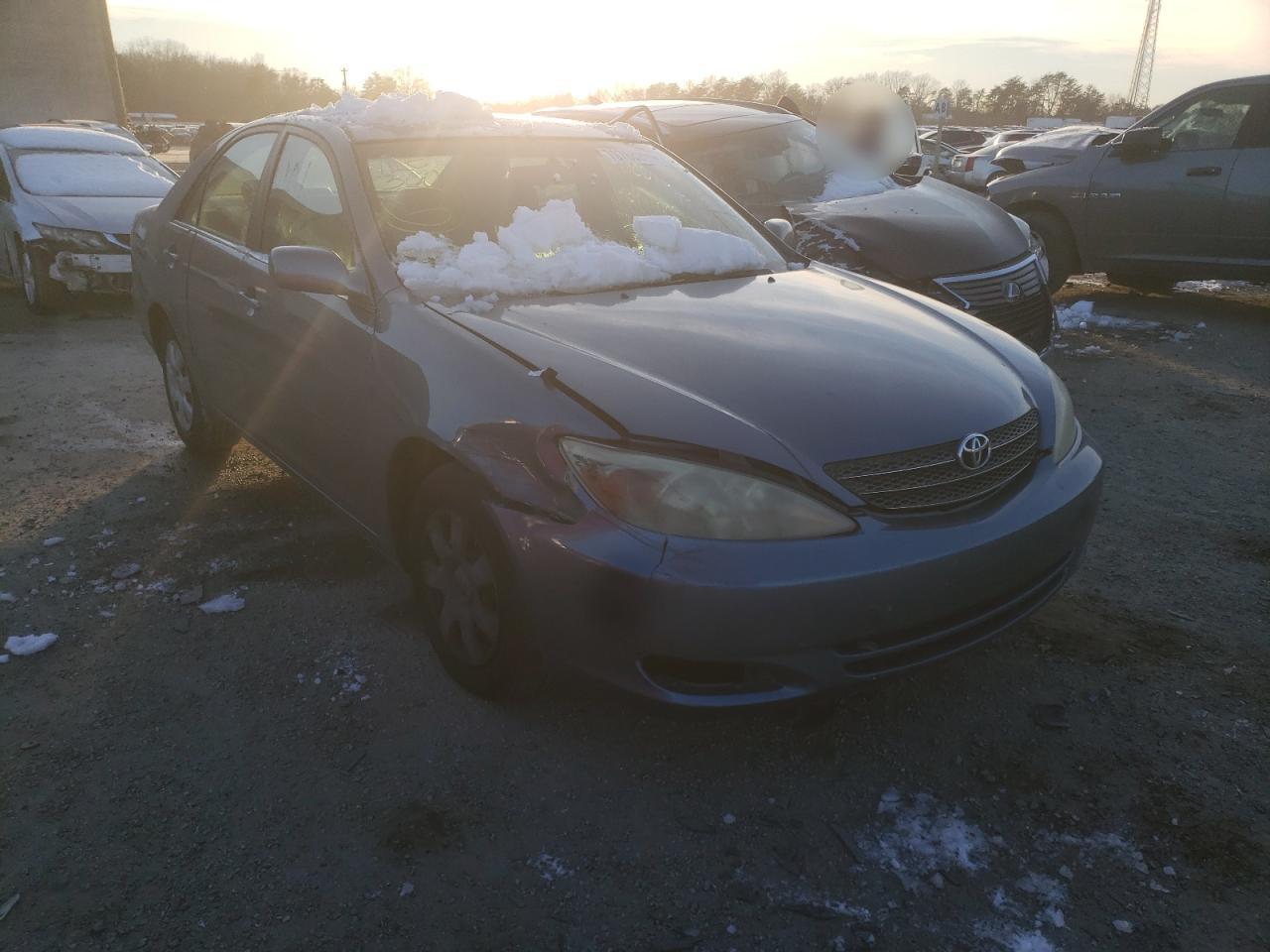 TOYOTA CAMRY LE 2004 with VIN JTDBE32K640259172 - Photo from auction