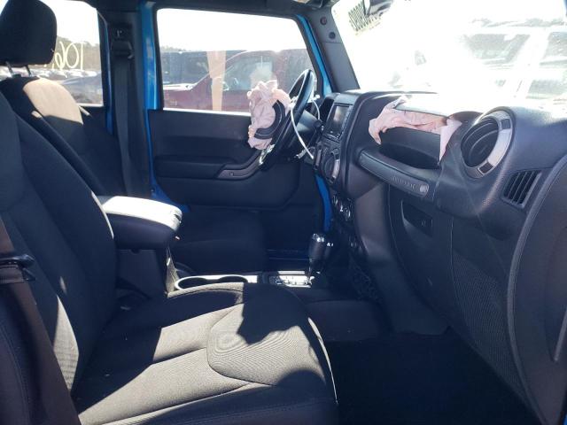 Photo 5 from auction – 2015 JEEP WRANGLER U with VIN 1C4BJWDG9FL608915