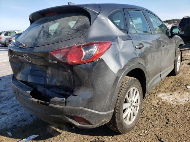 Photo 4 from auction – 2014 MAZDA CX-5 SPORT with VIN JM3KE2BE0E0401805