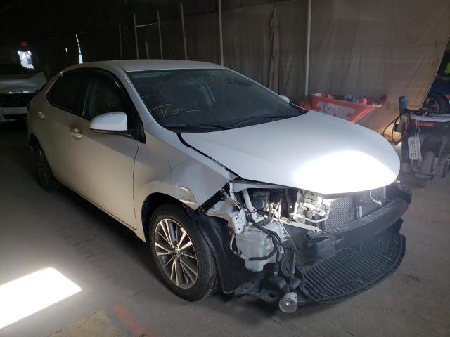 TOYOTA COROLLA L 2014 with VIN 5YFBURHE4EP117661 - Photo from auction