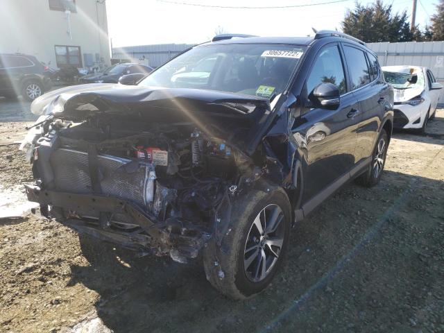 Photo 2 from auction – 2016 TOYOTA RAV4 XLE with VIN 2T3RFREV8GW453481