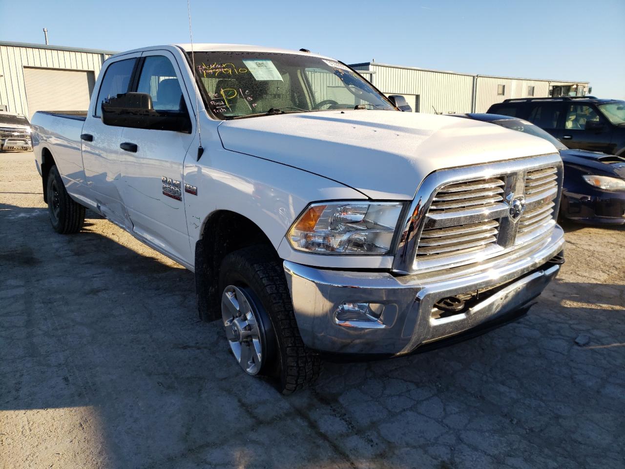 RAM 2500 SLT 2014 with VIN 3C6TR5JT5EG179106 - Photo from auction