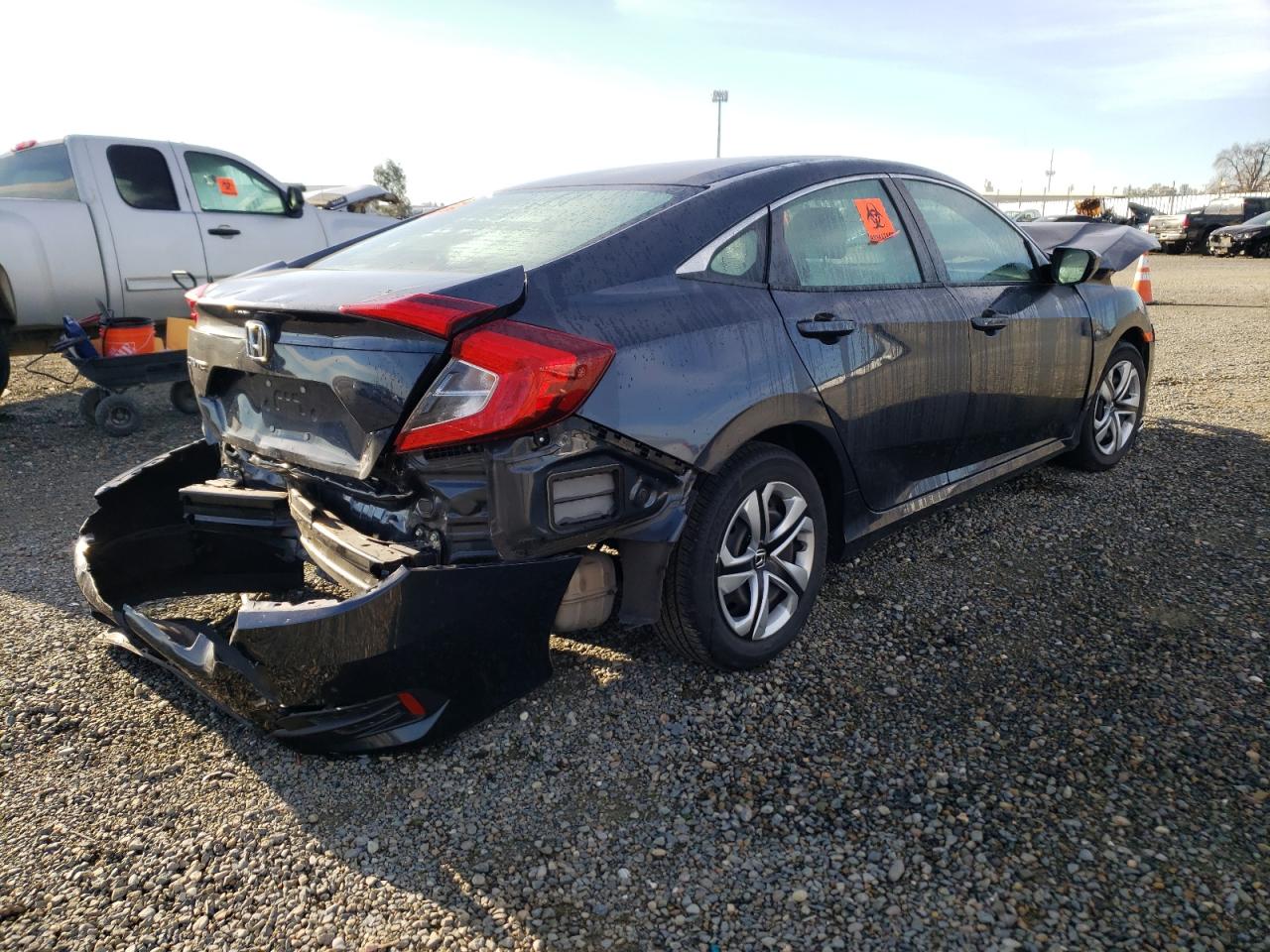 Photo 4 from auction – 2017 HONDA CIVIC LX with VIN 2HGFC2F55HH543966