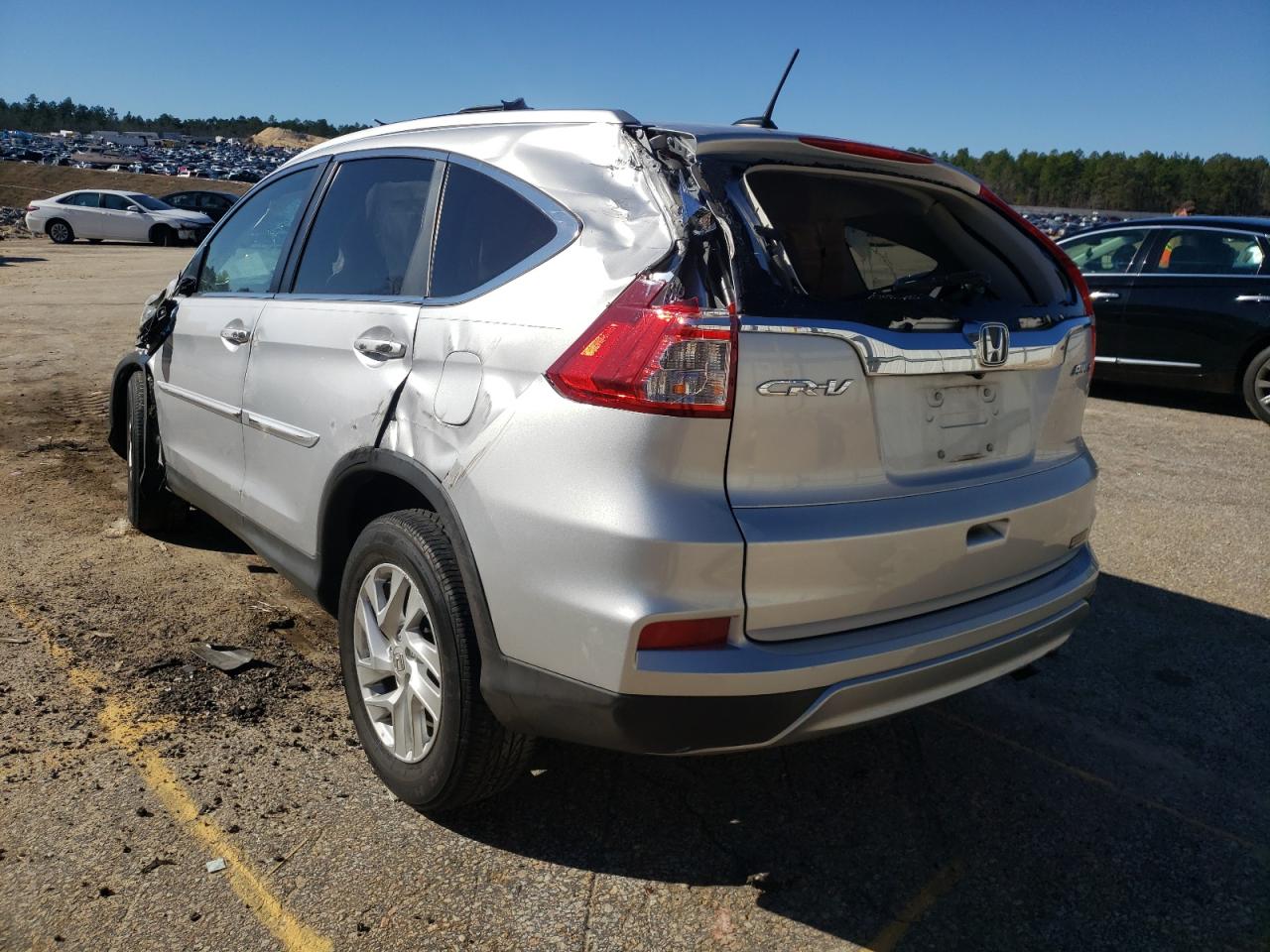 Photo 3 from auction – 2016 HONDA CR-V EXL with VIN 5J6RM4H71GL027943