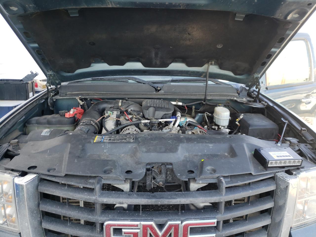Photo 7 from auction – 2010 GMC SIERRA K35 with VIN 1GT7K4B69AF122629