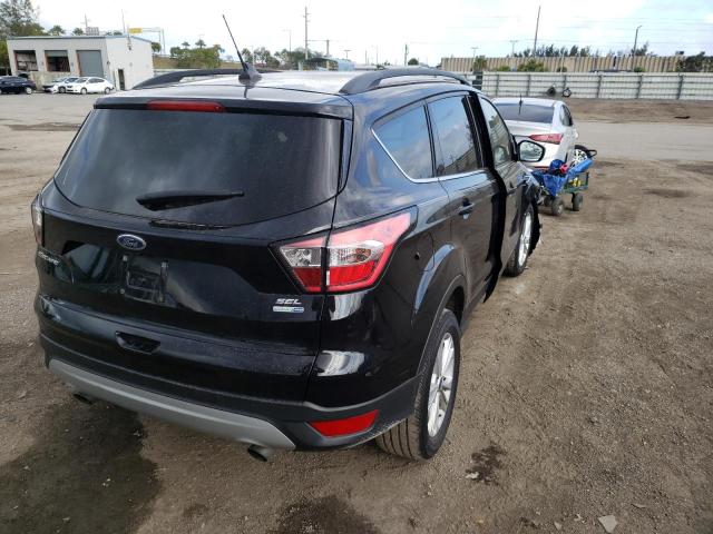 Photo 4 from auction – 2018 FORD ESCAPE SEL with VIN 1FMCU9HD8JUC56311