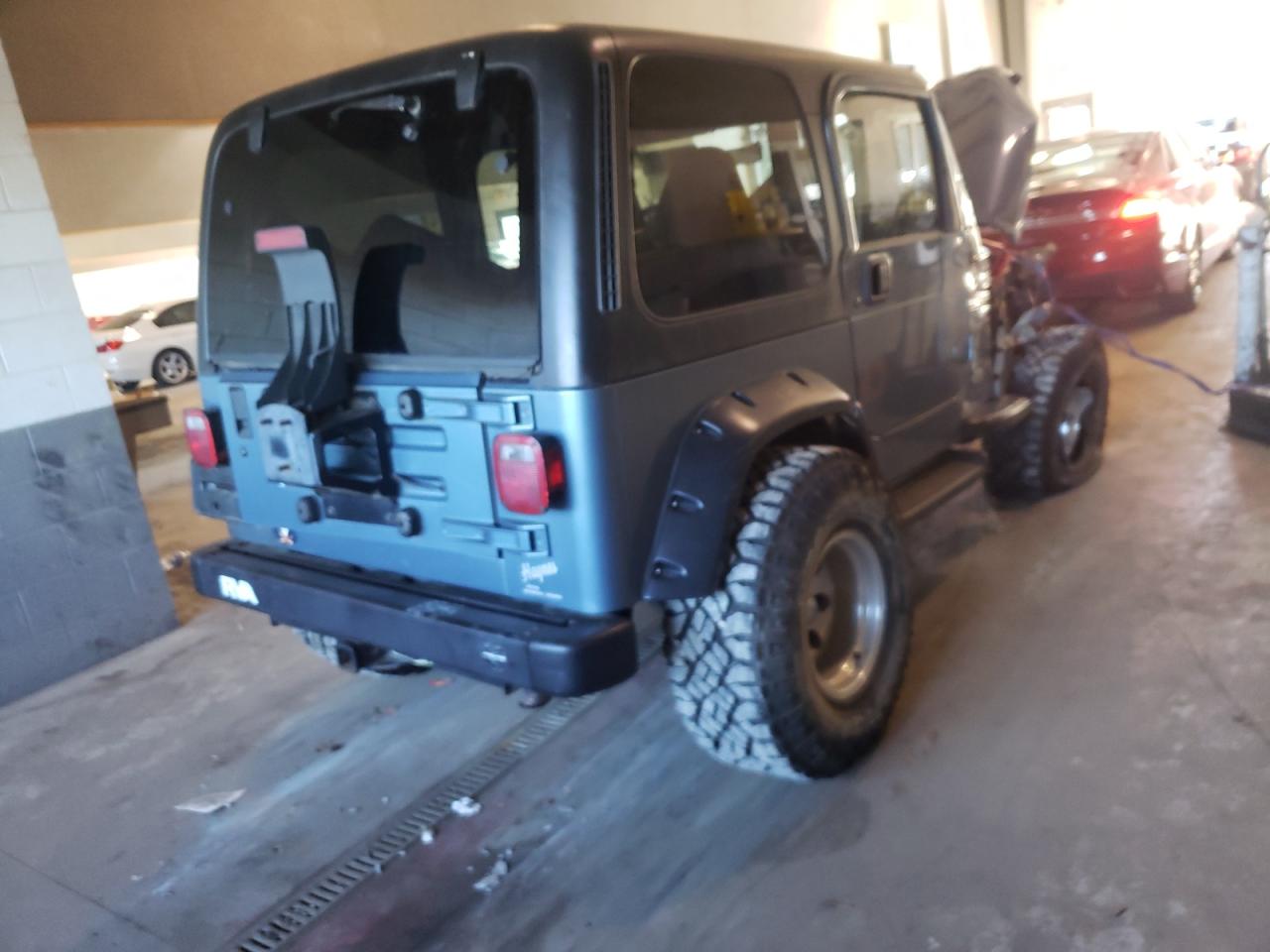 Photo 4 from auction – 1999 JEEP WRANGLER / with VIN 1J4FY19S2XP439693