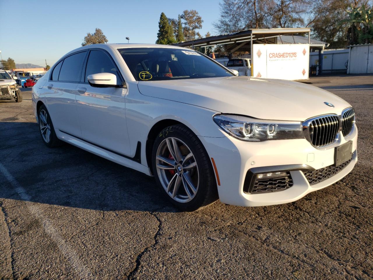 BMW 740 I 2016 with VIN WBA7E2C5XGG504136 - Photo from auction