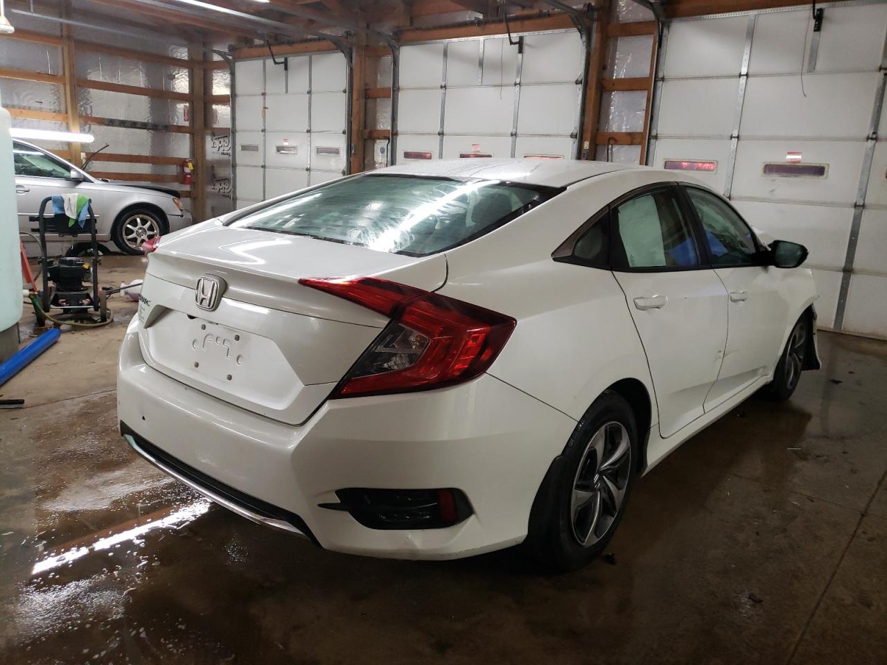 Photo 4 from auction – 2019 HONDA CIVIC LX with VIN 2HGFC2F68KH599867