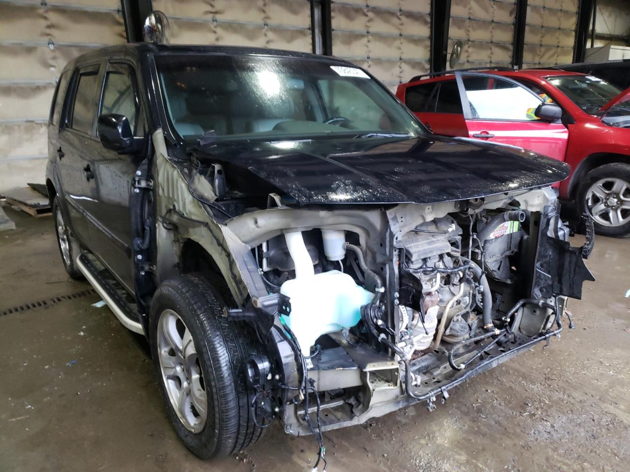 HONDA PILOT EXL 2012 with VIN 5FNYF4H59CB002215 - Photo from auction