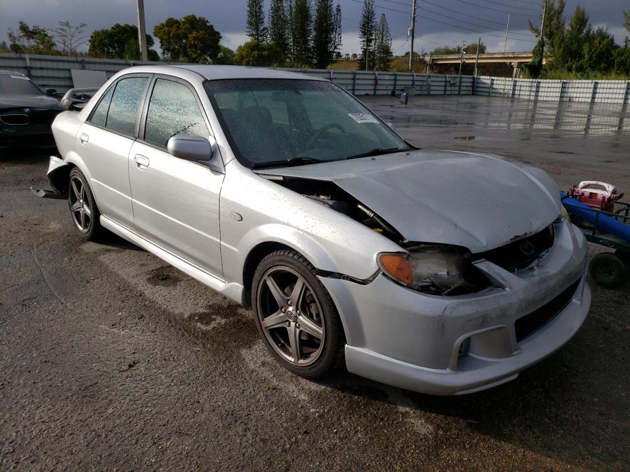 MAZDA PROTEGE SP 2003 with VIN JM1BJ227130648916 - Photo from auction