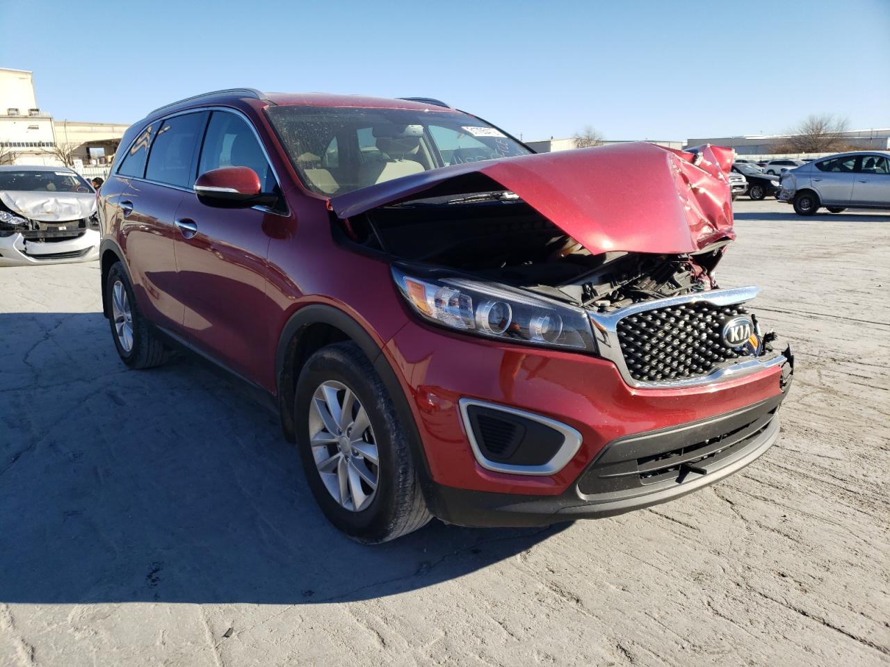 KIA SORENTO LX 2018 with VIN 5XYPG4A30JG403384 - Photo from auction