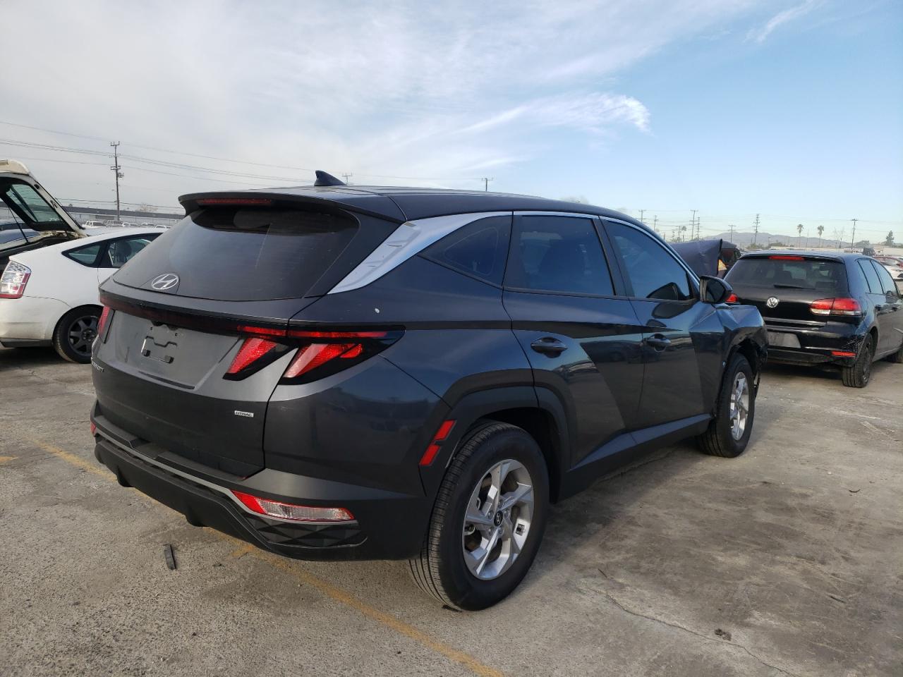 Photo 4 from auction – 2022 HYUNDAI TUCSON SE with VIN 5NMJACAE2NH034607
