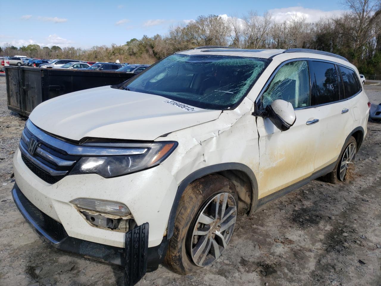Photo 2 from auction – 2018 HONDA PILOT TOUR with VIN 5FNYF5H95JB019373