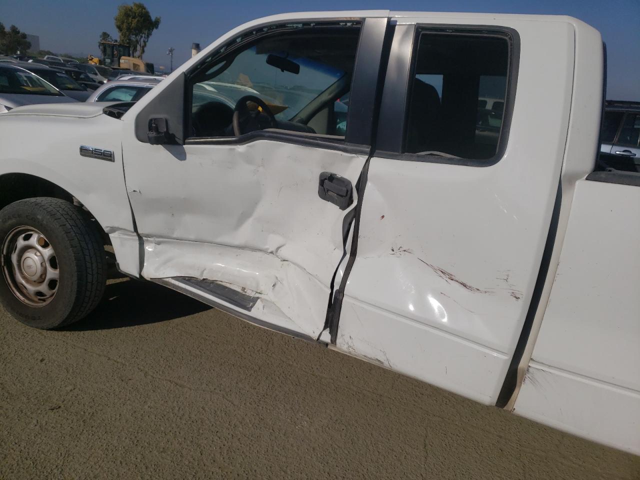 Photo 9 from auction – 2006 FORD F150 with VIN 1FTRX12W66KD93333