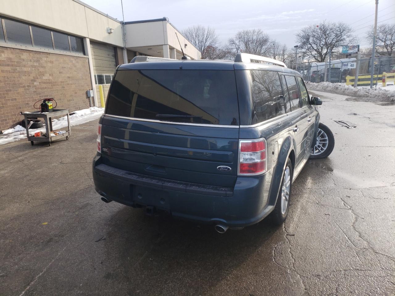Photo 4 from auction – 2016 FORD FLEX SEL with VIN 2FMGK5C83GBA04667