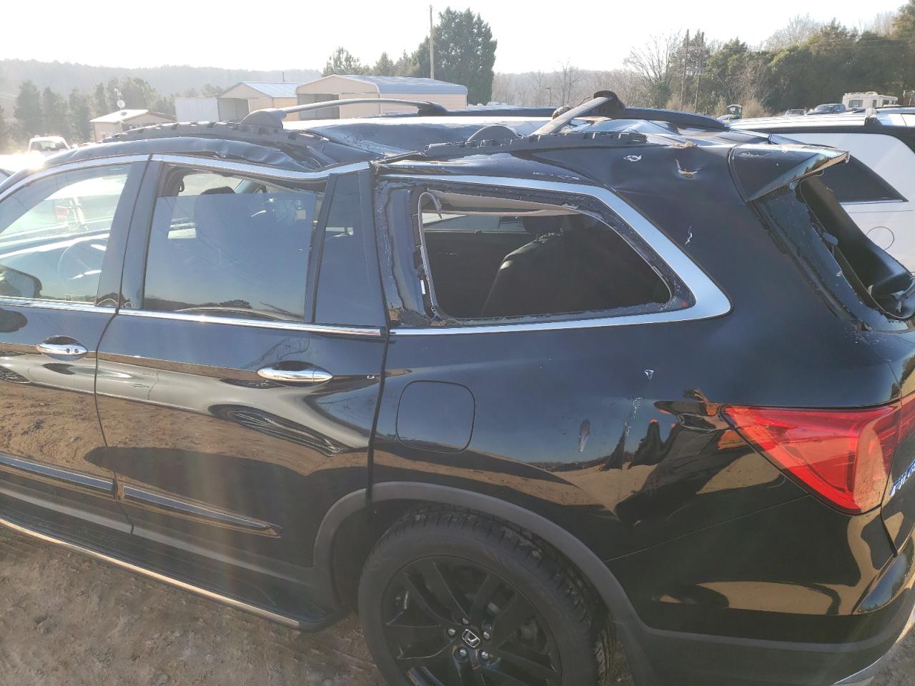 Photo 9 from auction – 2017 HONDA PILOT ELIT with VIN 5FNYF6H06HB037625