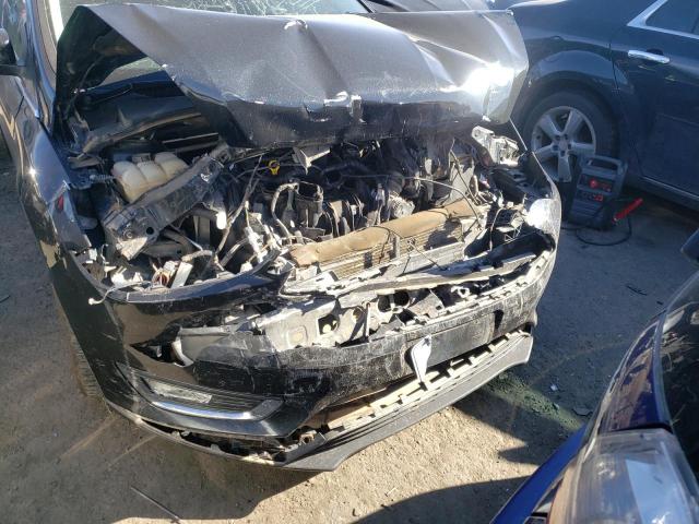 Photo 9 from auction – 2015 FORD FOCUS TITA with VIN 1FADP3N22FL299657