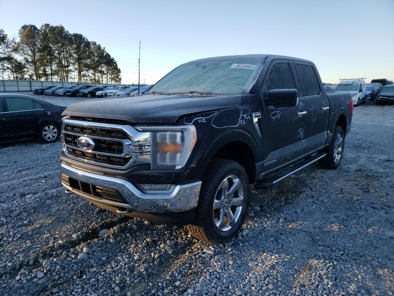 Photo 2 from auction – 2021 FORD F150 SUPER with VIN 1FTFW1ED8MFB99215