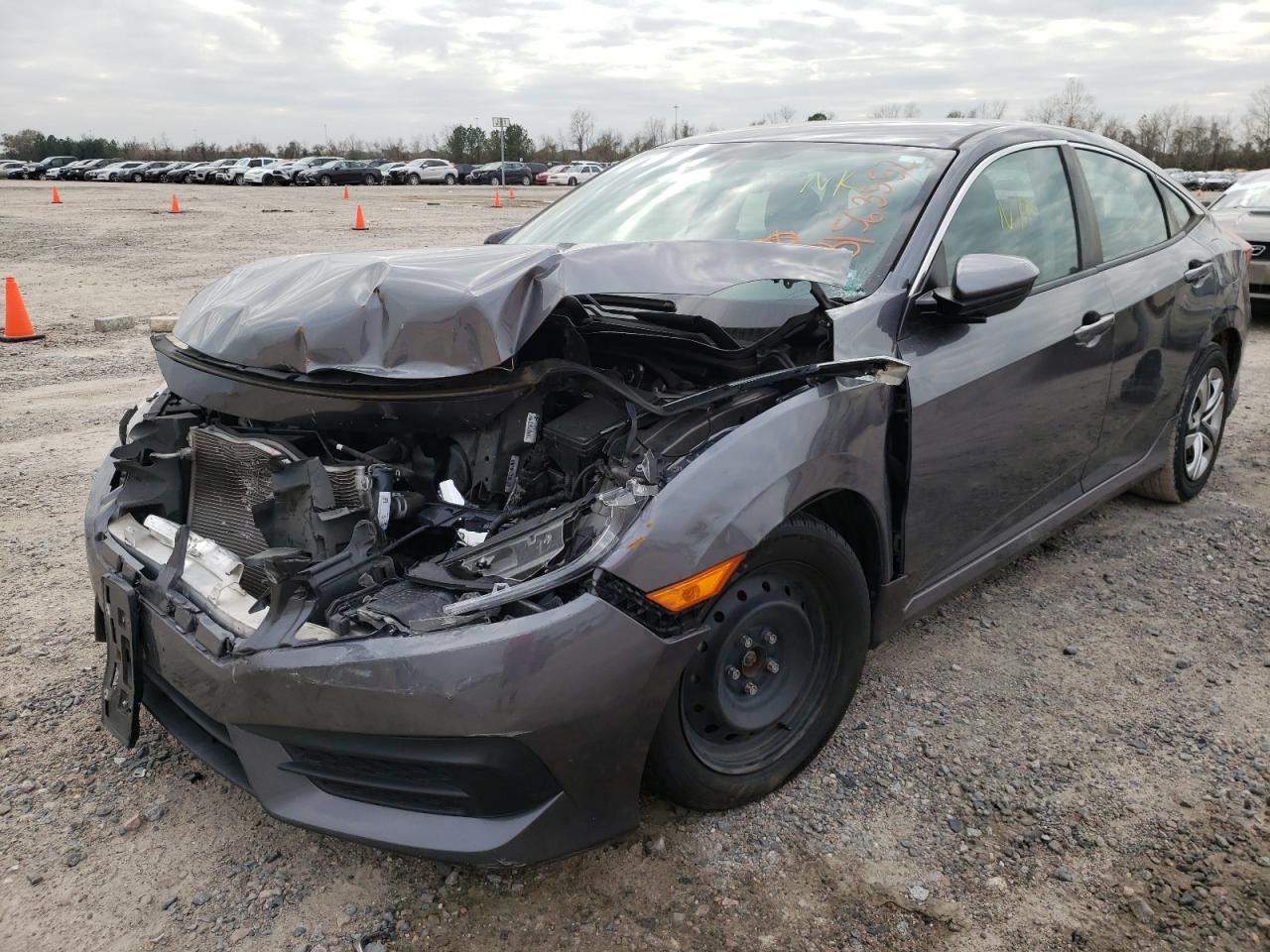 Photo 2 from auction – 2016 HONDA CIVIC LX with VIN 19XFC2F54GE023623