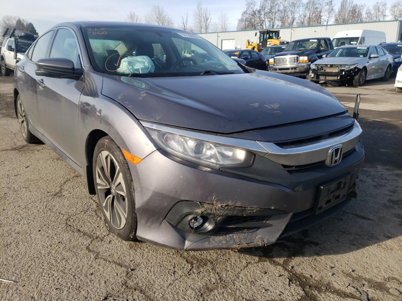 HONDA CIVIC EX 2017 with VIN 19XFC1F33HE211513 - Photo from auction