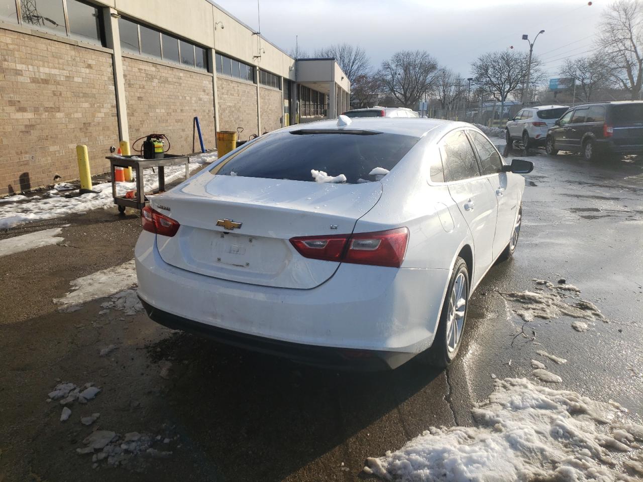 Photo 4 from auction – 2017 CHEVROLET MALIBU LT with VIN 1G1ZE5ST0HF131430