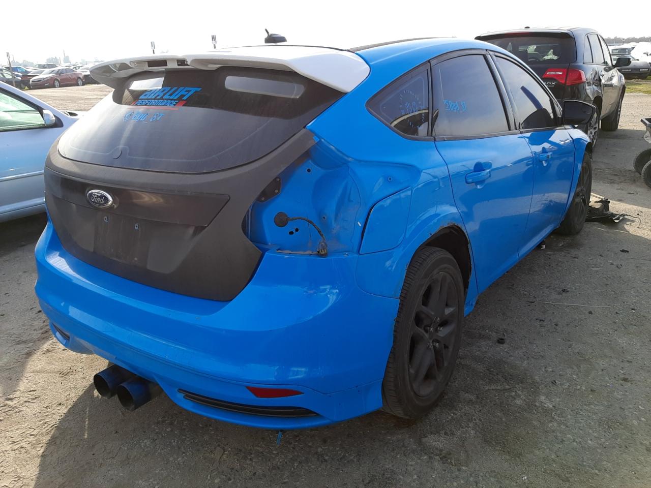 Photo 4 from auction – 2014 FORD FOCUS ST with VIN 1FADP3L97EL210051