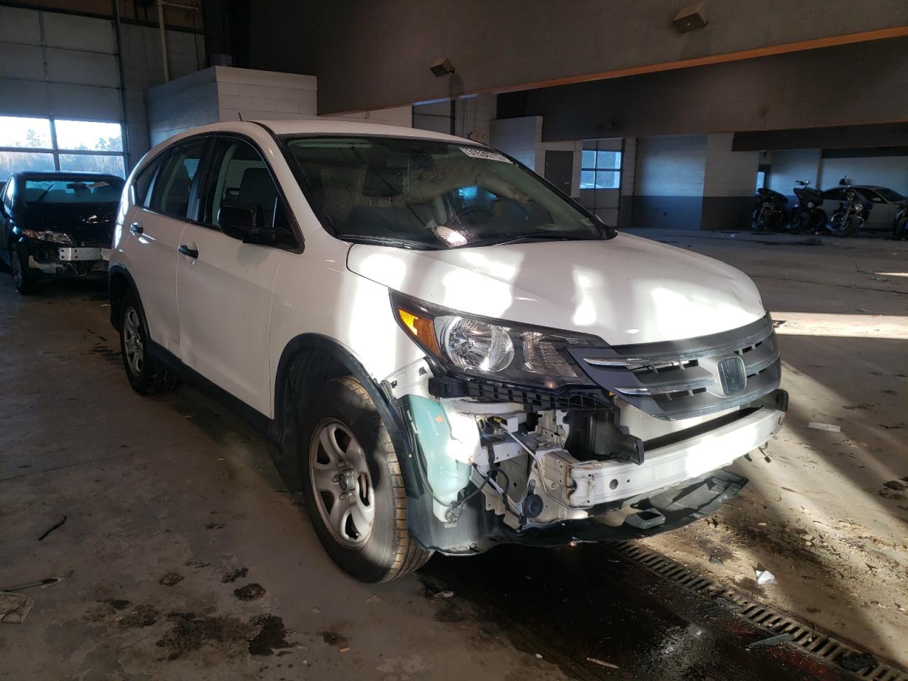 HONDA CR-V LX 2012 with VIN 3CZRM3H30CG700333 - Photo from auction