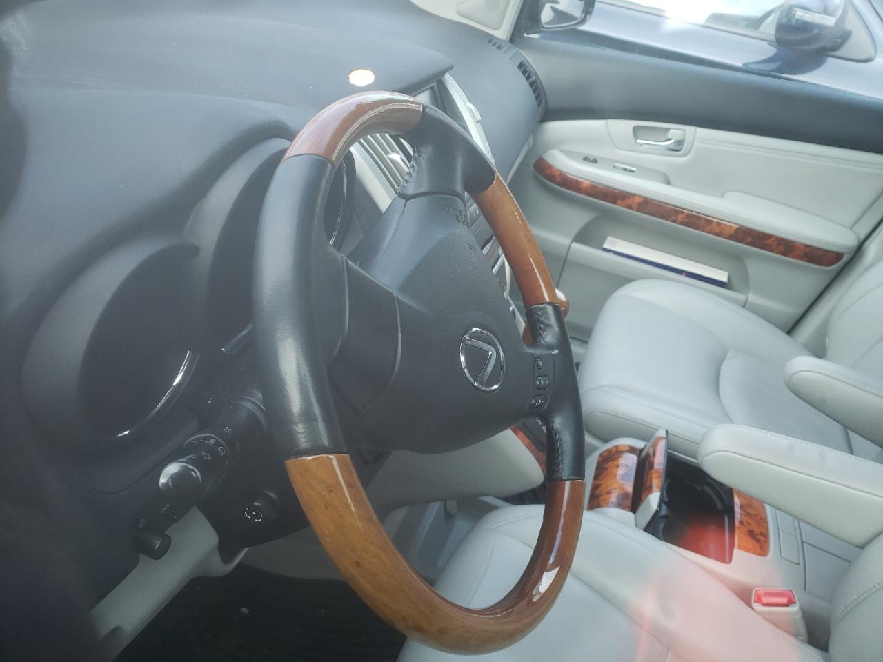 Photo 8 from auction – 2009 LEXUS RX 350 L with VIN 2T2HK31U67C034536