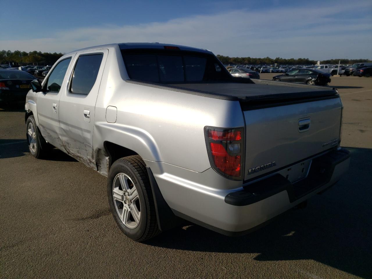 Photo 3 from auction – 2012 HONDA RIDGELINE with VIN 5FPYK1F58CB001089