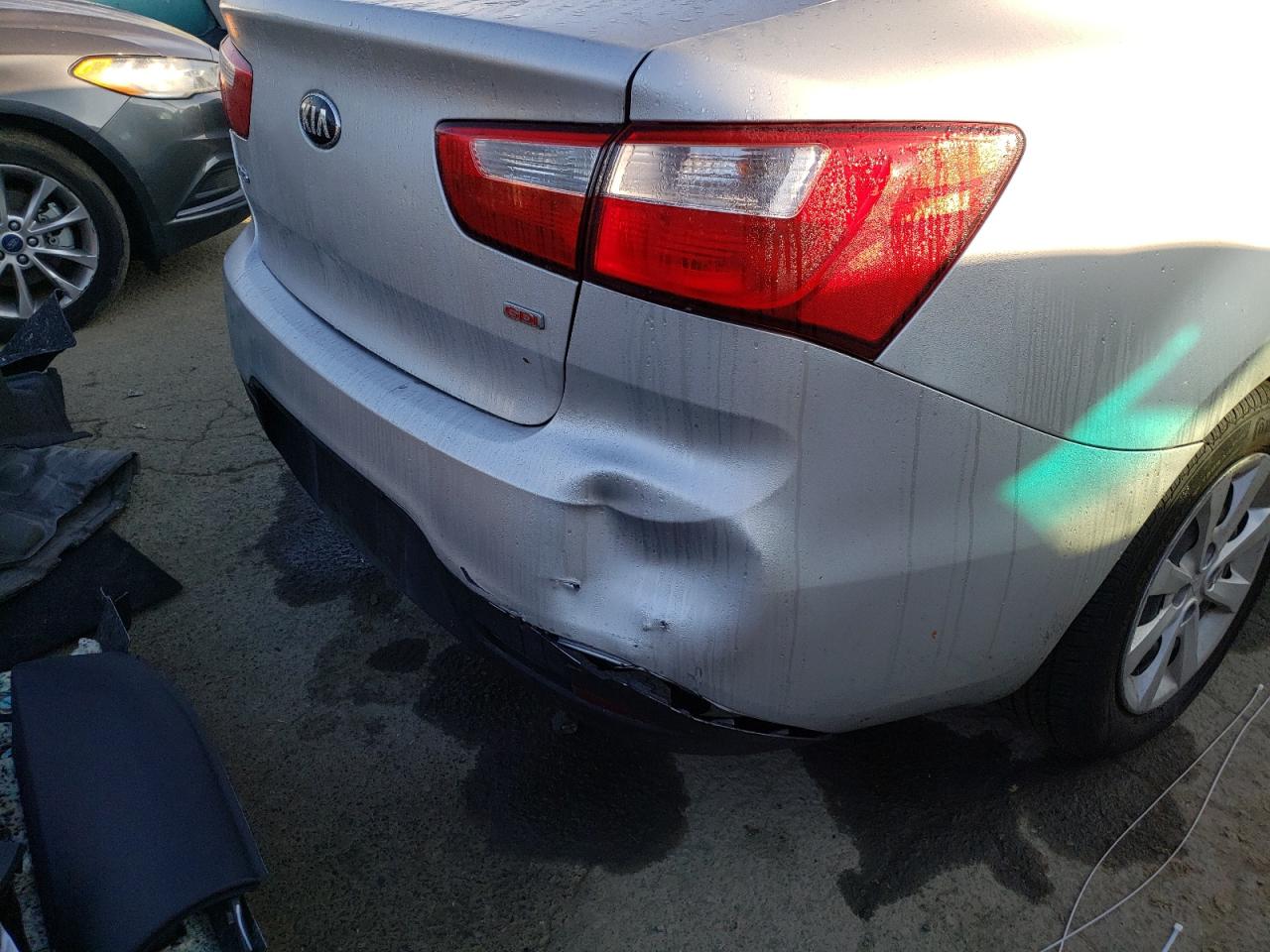 Photo 9 from auction – 2014 KIA RIO LX with VIN KNADM4A31E6385897