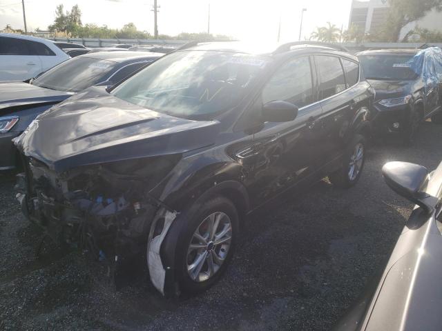 Photo 2 from auction – 2018 FORD ESCAPE SEL with VIN 1FMCU9HD8JUC56311