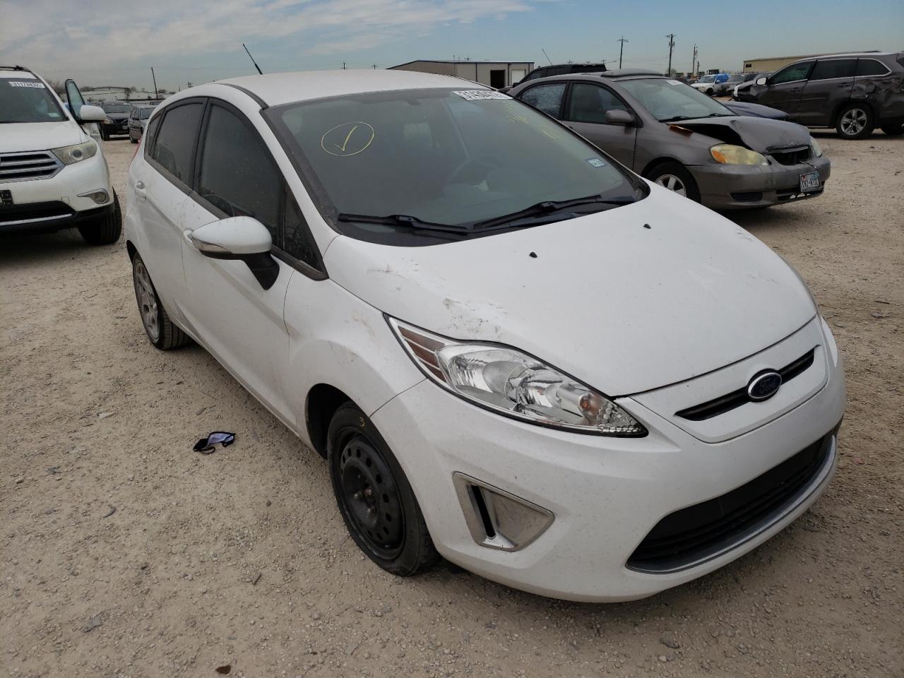 FORD FIESTA SES 2011 with VIN 3FADP4FJ0BM196998 - Photo from auction
