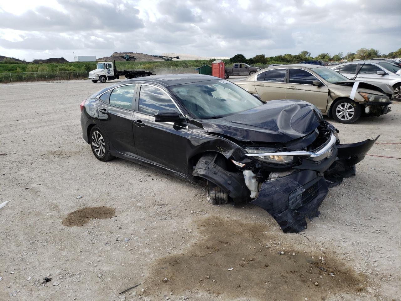HONDA CIVIC EX 2016 with VIN 19XFC2F79GE056537 - Photo from auction