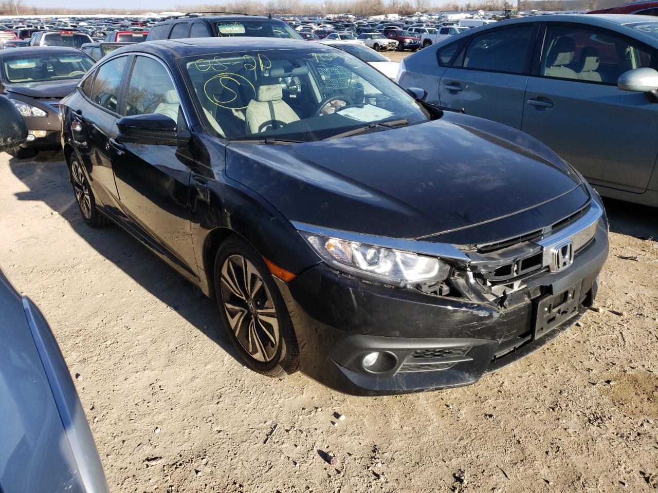 HONDA CIVIC EX 2017 with VIN 19XFC1F34HE205851 - Photo from auction