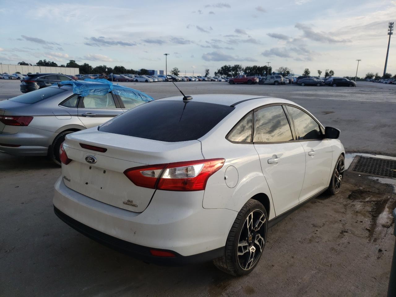 Photo 4 from auction – 2012 FORD FOCUS SE with VIN 1FAHP3F28CL367634