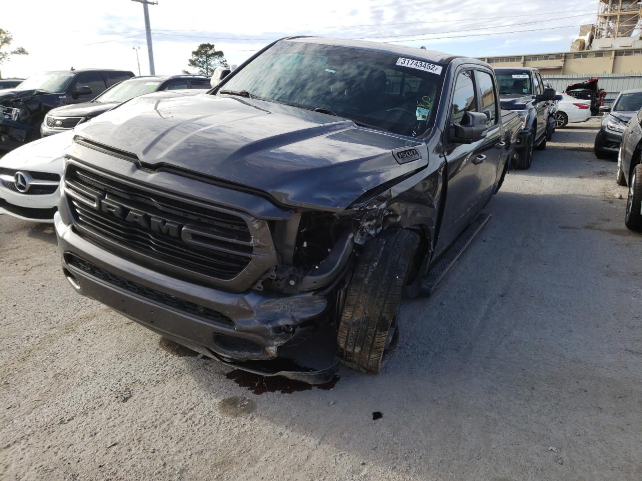 Photo 2 from auction – 2019 RAM 1500 BIG H with VIN 1C6RREFT8KN558025