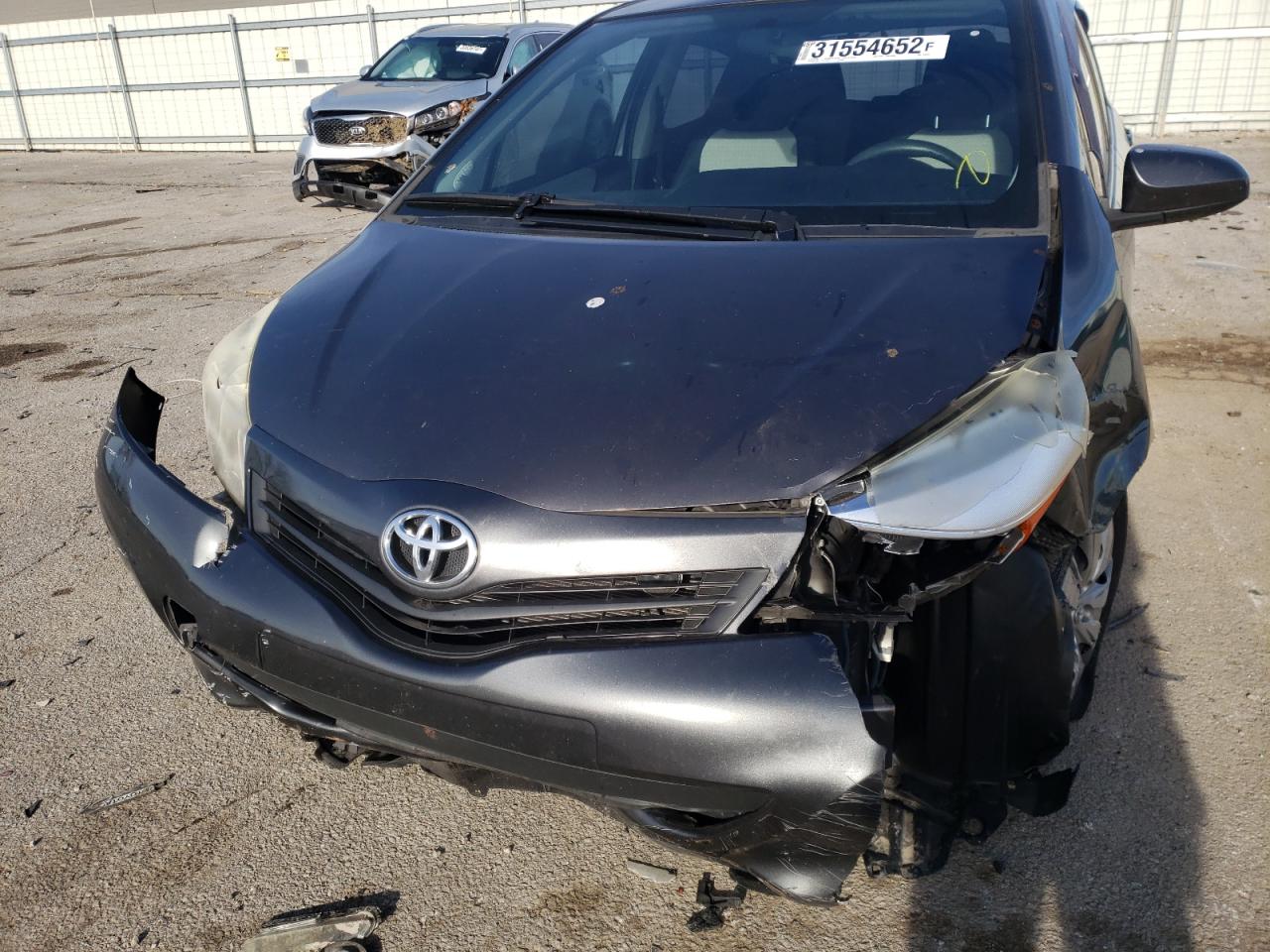 Photo 9 from auction – 2012 TOYOTA YARIS with VIN JTDKTUD38CD510945