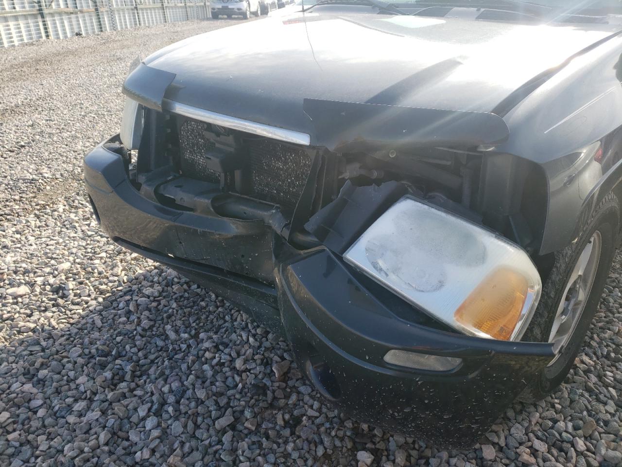 Photo 10 from auction – 2005 GMC ENVOY with VIN 1GKDT13S352133993