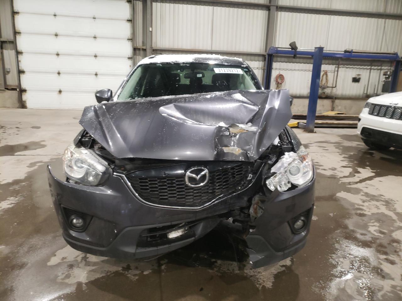 Photo 9 from auction – 2014 MAZDA CX-5 TOURI with VIN JM3KE2CY4E0307032