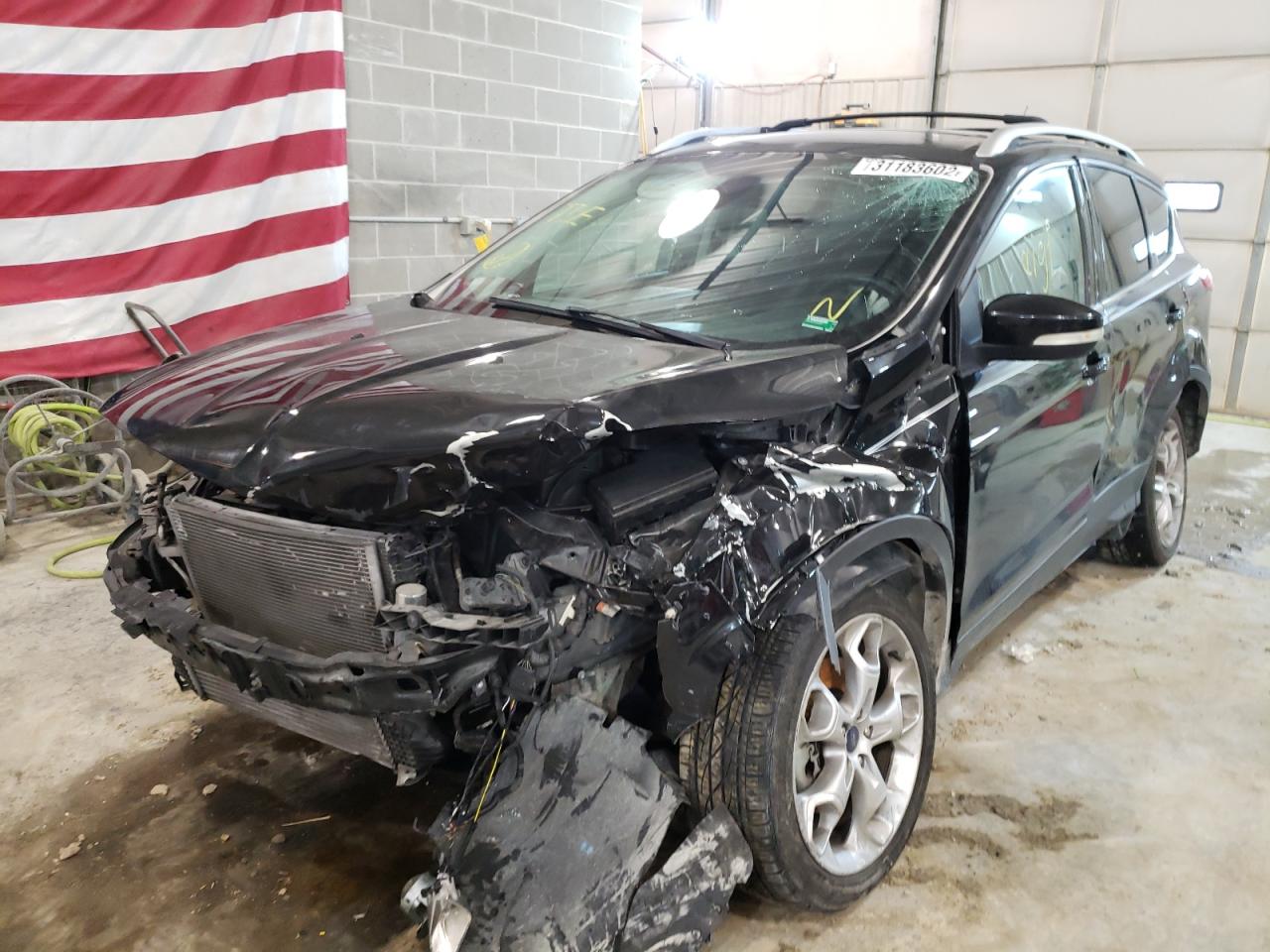 Photo 2 from auction – 2013 FORD ESCAPE TIT with VIN 1FMCU9J98DUA98384