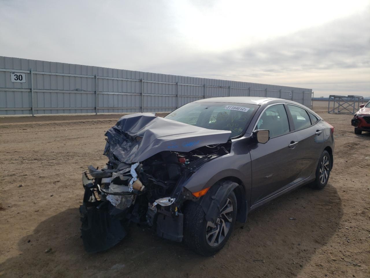 Photo 2 from auction – 2018 HONDA CIVIC EX with VIN 2HGFC2F78JH526019
