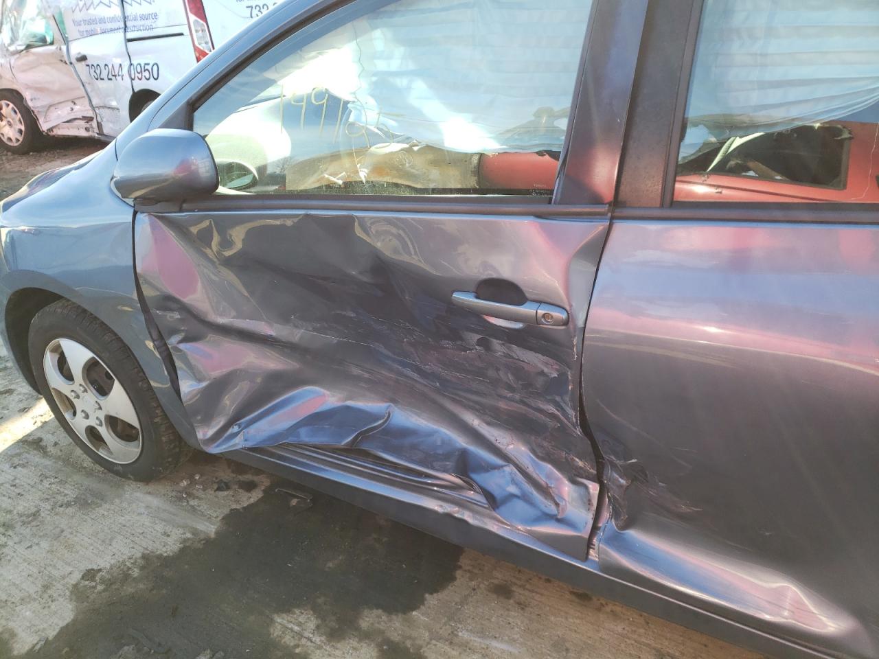 Photo 9 from auction – 2012 TOYOTA YARIS with VIN JTDBT4K39CL021768
