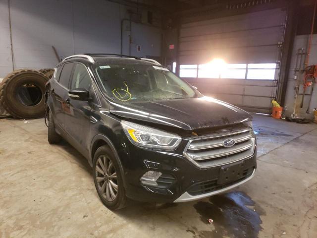 FORD ESCAPE TIT 2017 with VIN 1FMCU9J91HUB94170 - Photo from auction