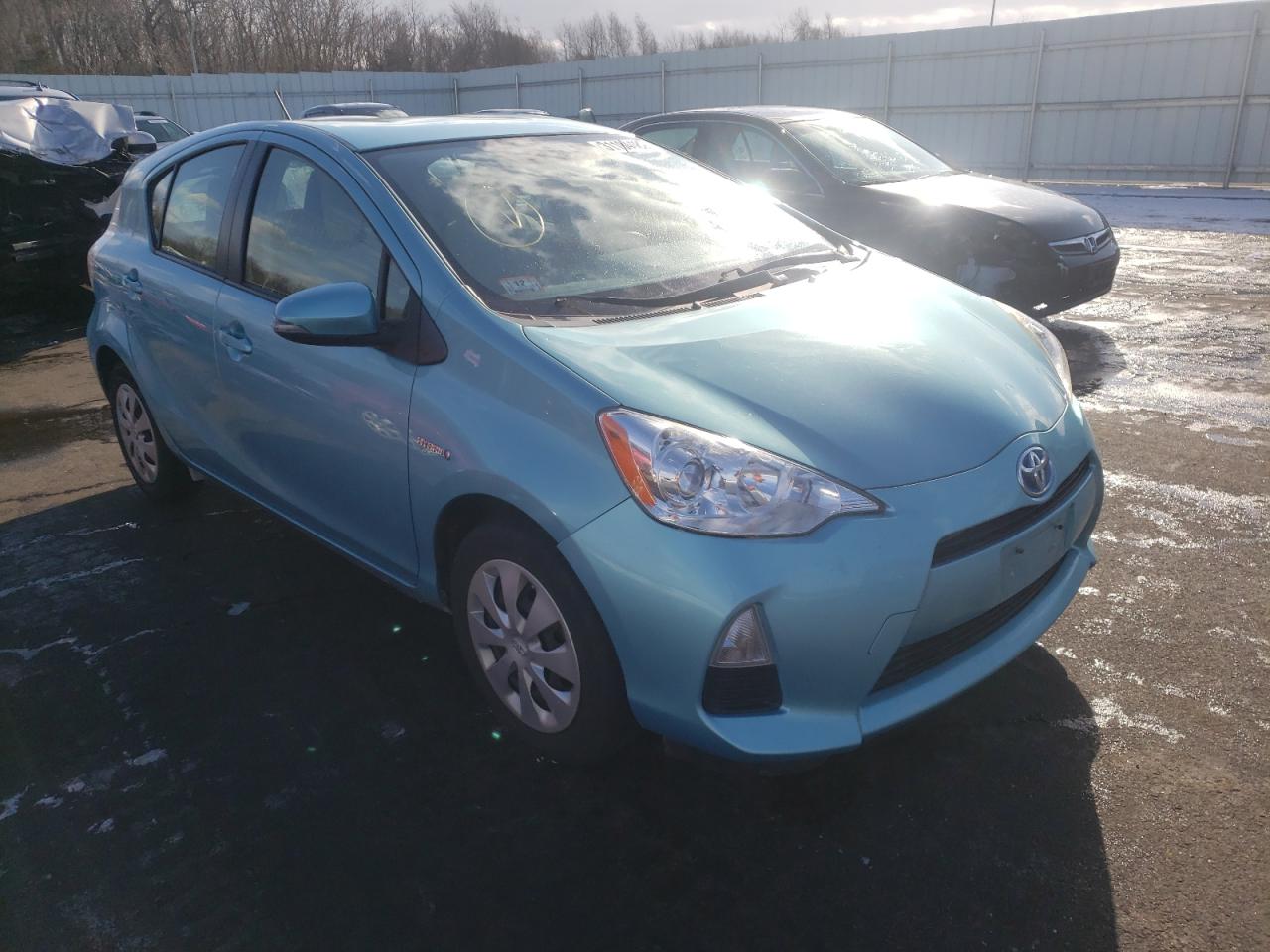 TOYOTA PRIUS C 2014 with VIN JTDKDTB34E1085593 - Photo from auction