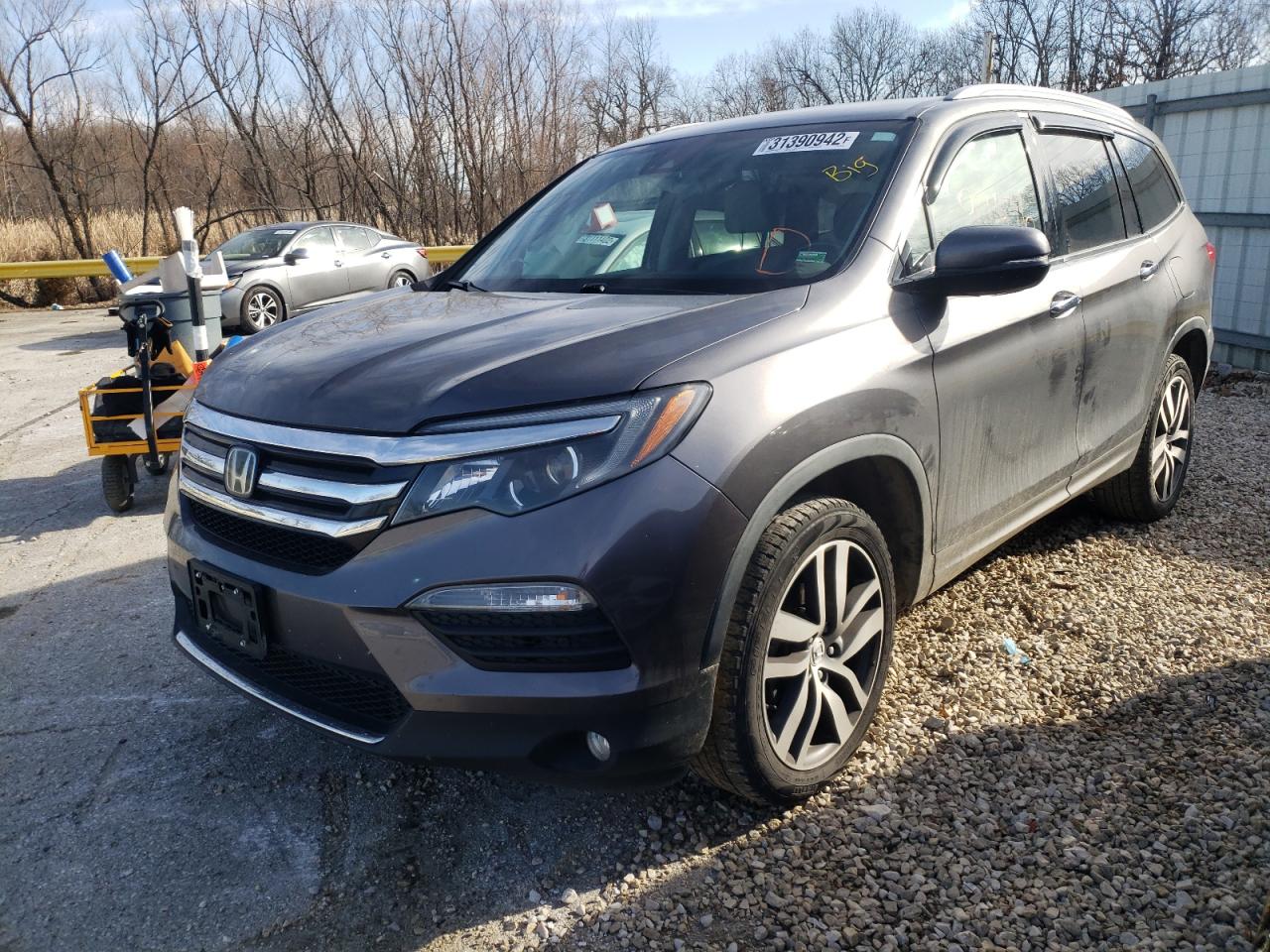 Photo 2 from auction – 2017 HONDA PILOT ELIT with VIN 5FNYF6H02HB023348