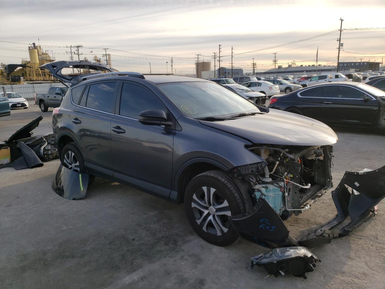 TOYOTA RAV4 LE 2018 with VIN JTMZFREV2JJ162433 - Photo from auction