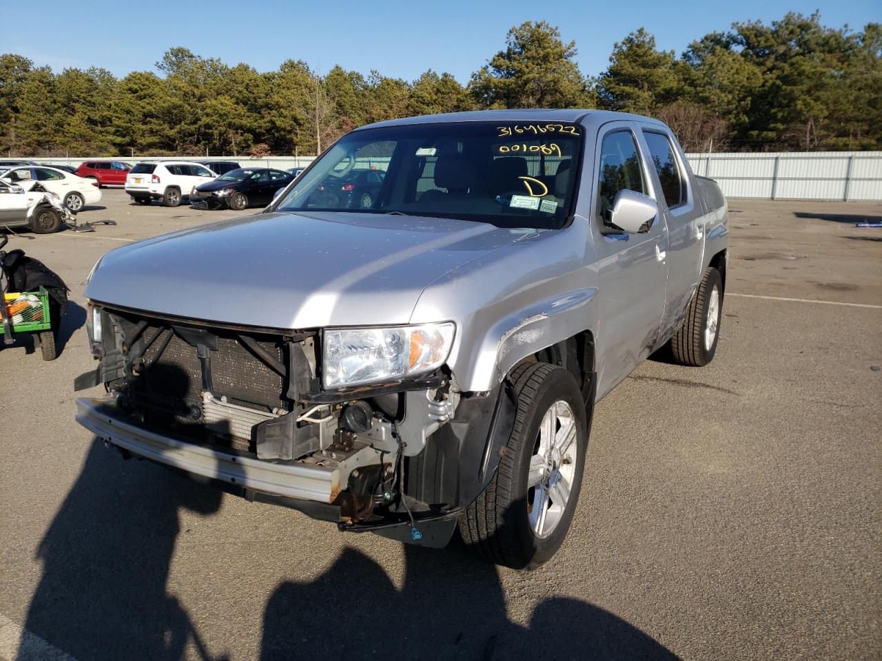 Photo 2 from auction – 2012 HONDA RIDGELINE with VIN 5FPYK1F58CB001089