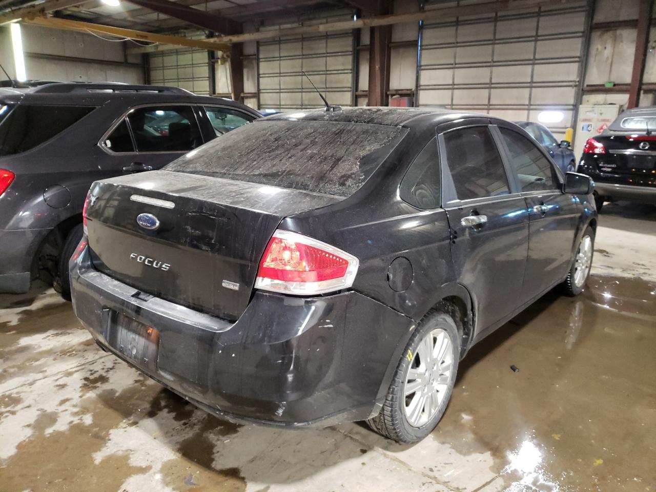 Photo 4 from auction – 2011 FORD FOCUS with VIN 1FAHP3HN7BW106516
